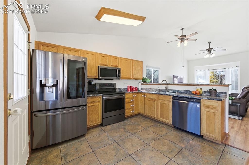 Image 9 of 32: Open Floorplan with vaulted ceilings