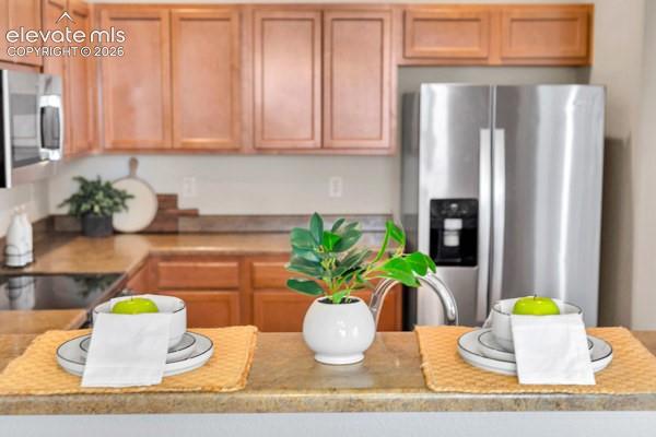 Image 13 of 35: Passthrough or Breakfast Bar!