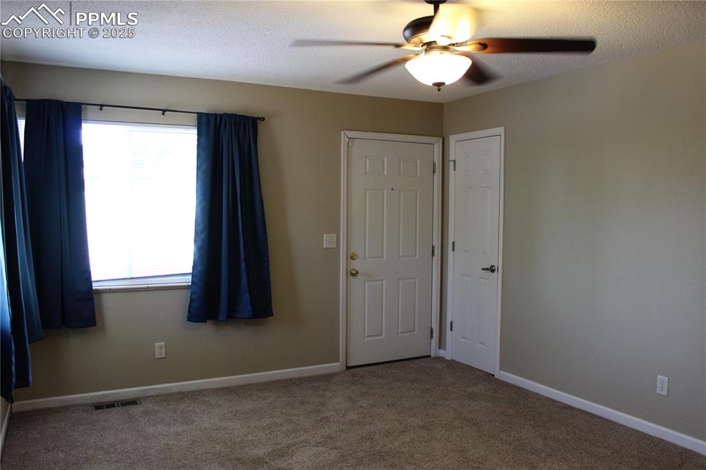 Image 8 of 19: 2012 Front Bedroom