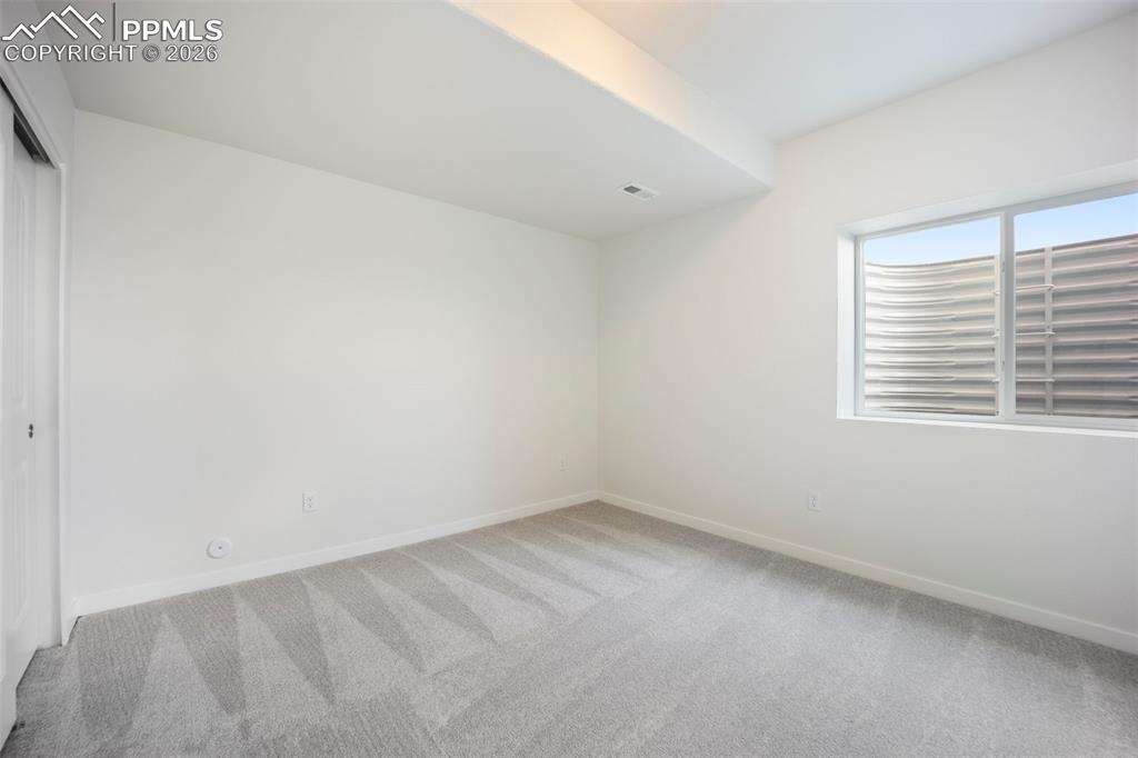 Image 32 of 37: Bedroom