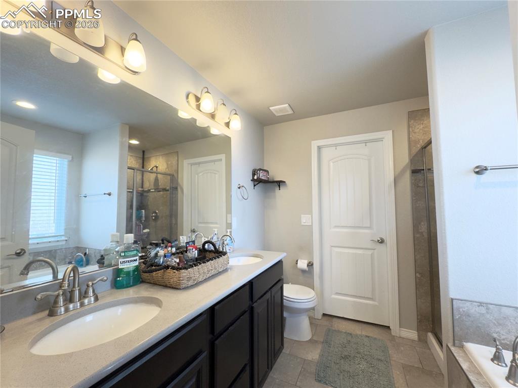 Image 11 of 20: Master Bathroom