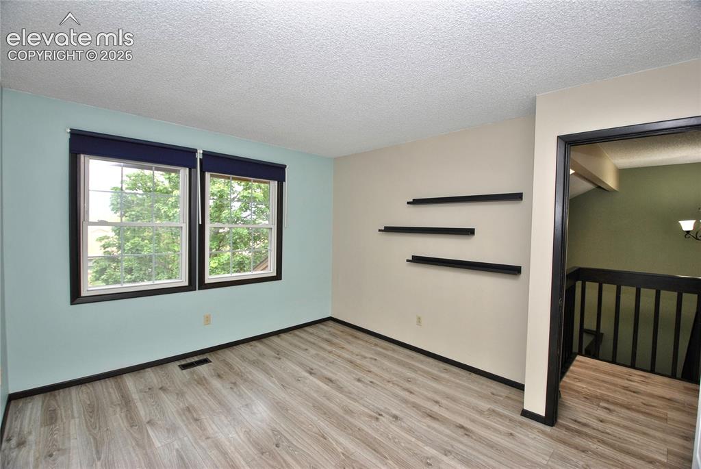 Image 18 of 27: Master Bedroom