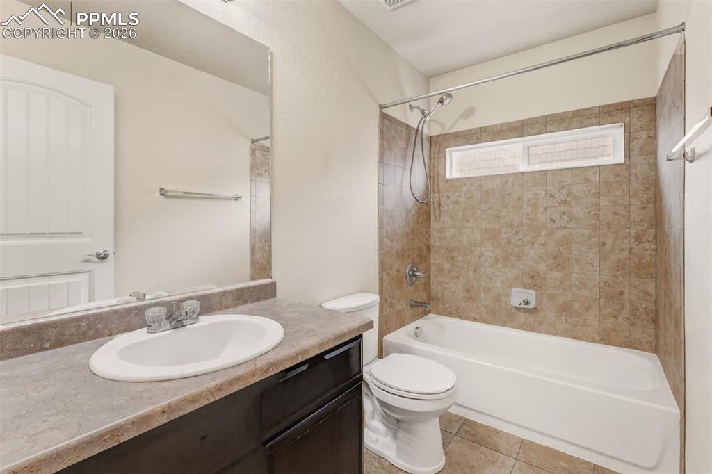 Image 18 of 35: Full bathroom on the main level.