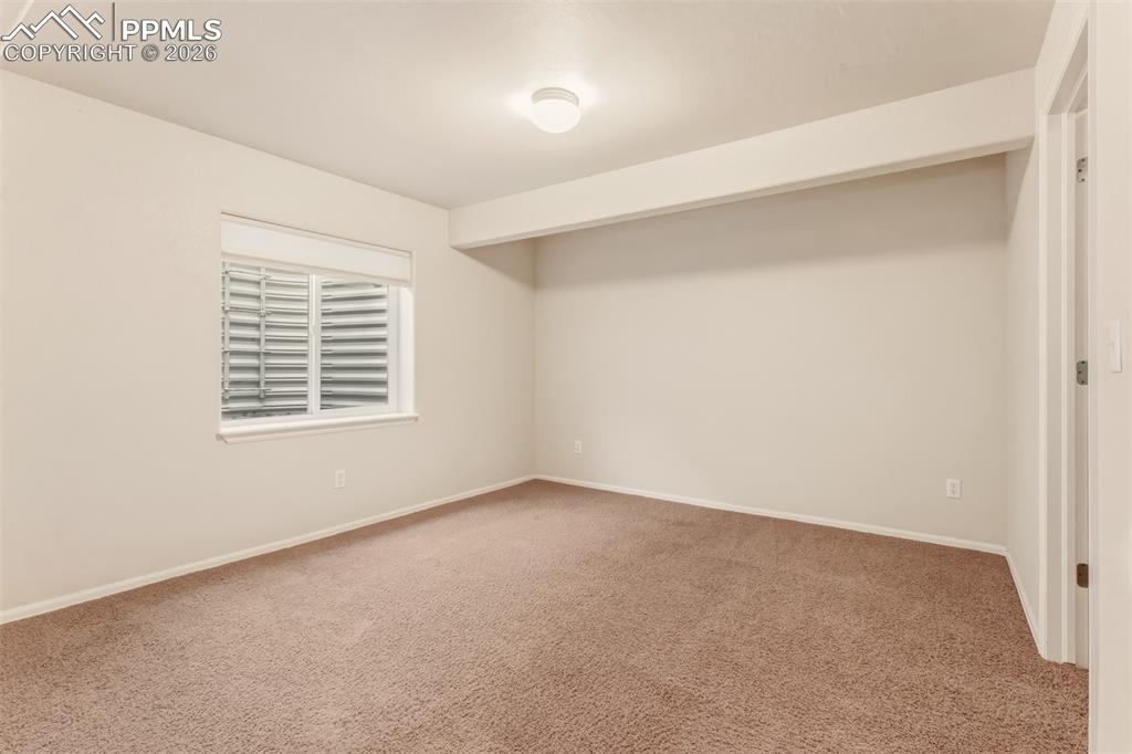 Image 24 of 35: Bedroom #4 with large walk-in closet in Southeast corner near the bathroom.