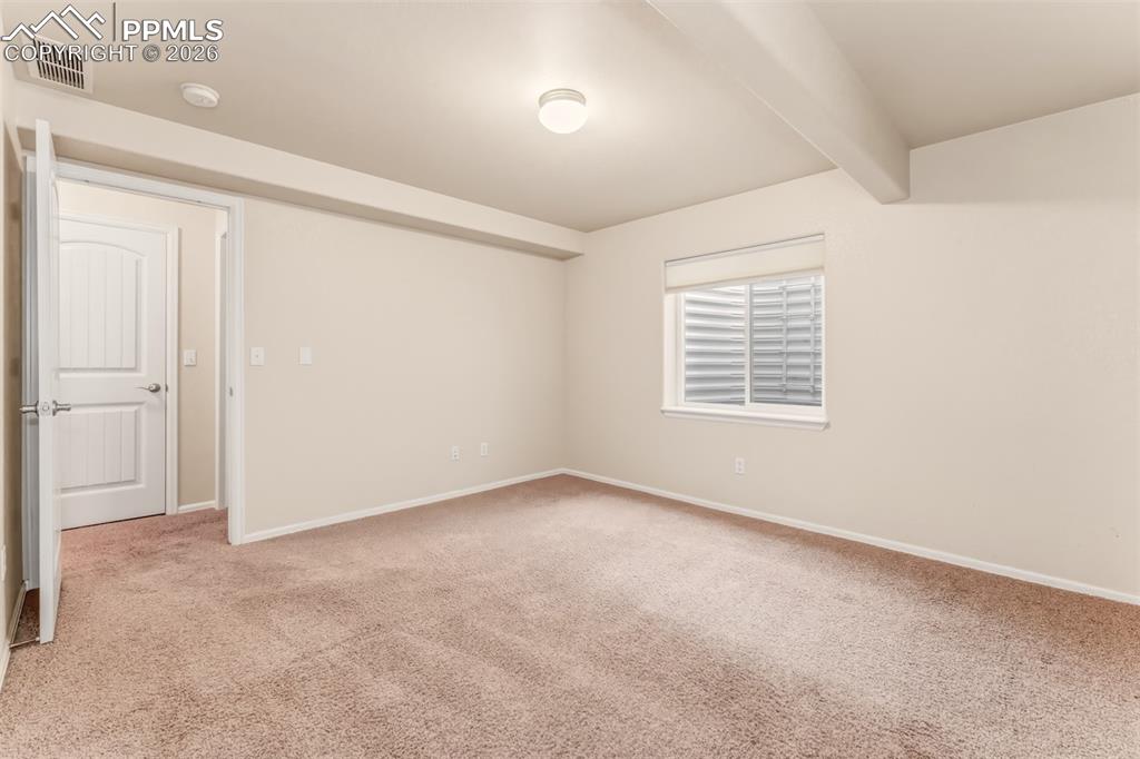 Image 25 of 35: Bedroom #4 looking into the hallway at the linen closet next to the basemen