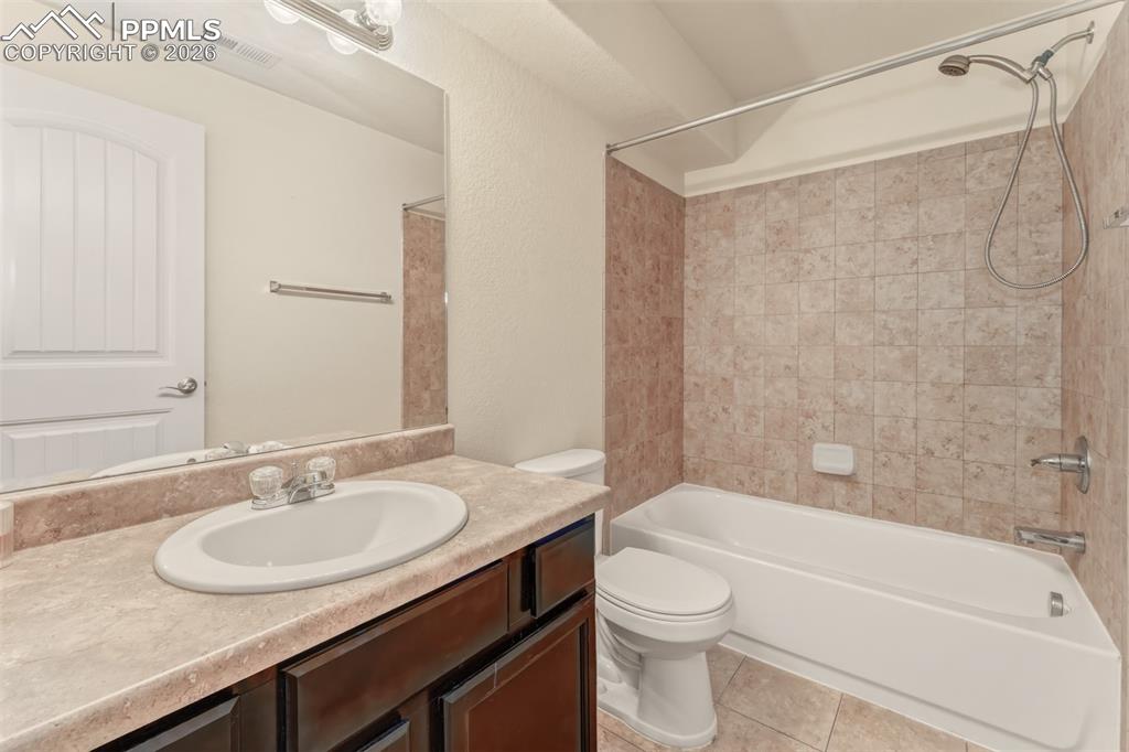 Image 26 of 35: Full bathroom in basement.