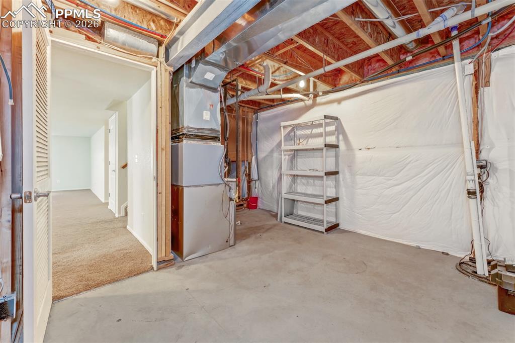 Image 29 of 35: Storage/utility room. Plenty of room to hold extra stuff.