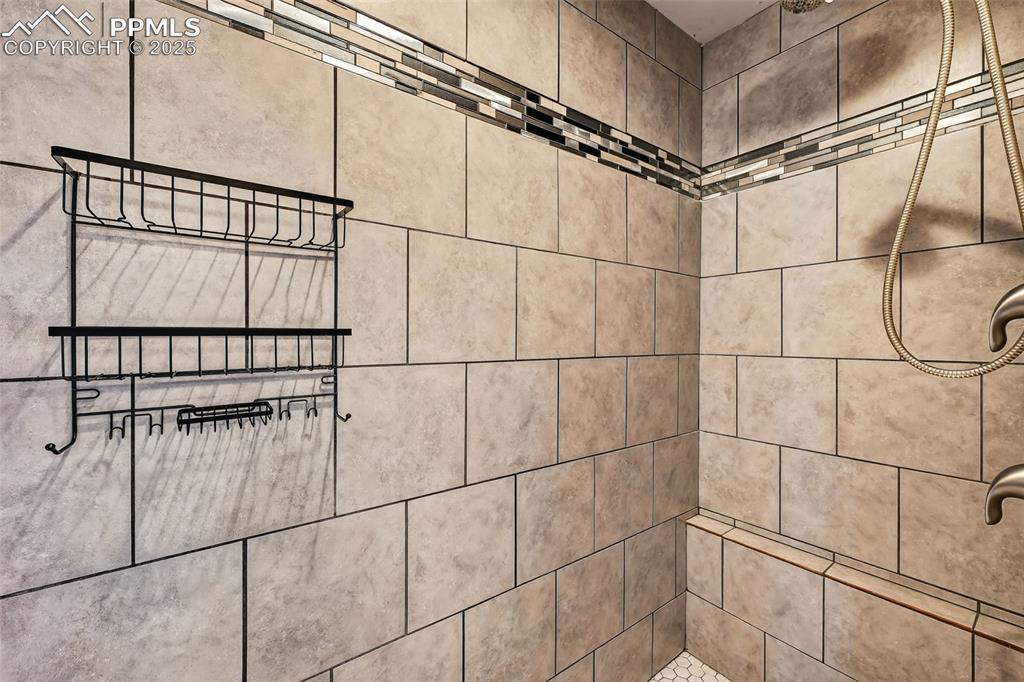 Image 31 of 50: Bathroom view of tiled shower