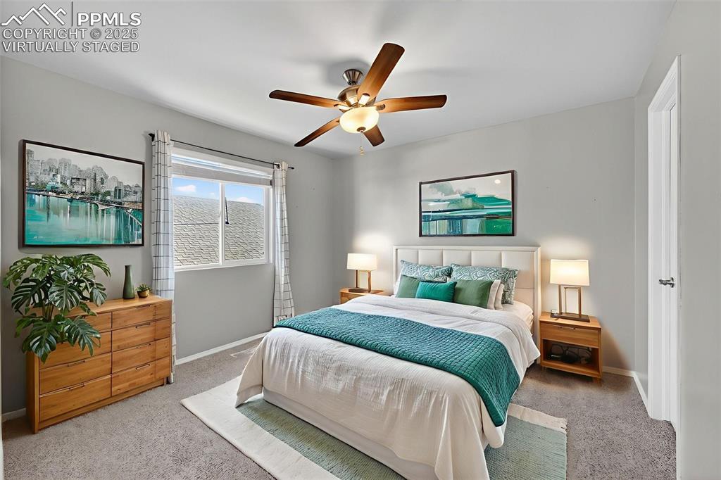 Image 32 of 50: Virtually staged. Upstairs bedroom.