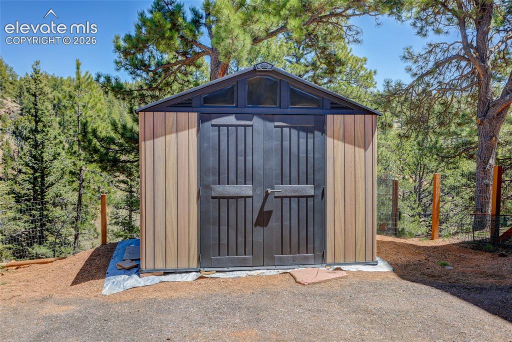 Image 23 of 28: Storage shed