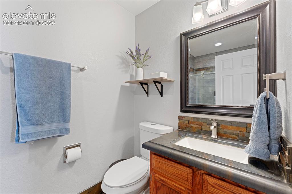 Image 19 of 50: Main floor bathroom