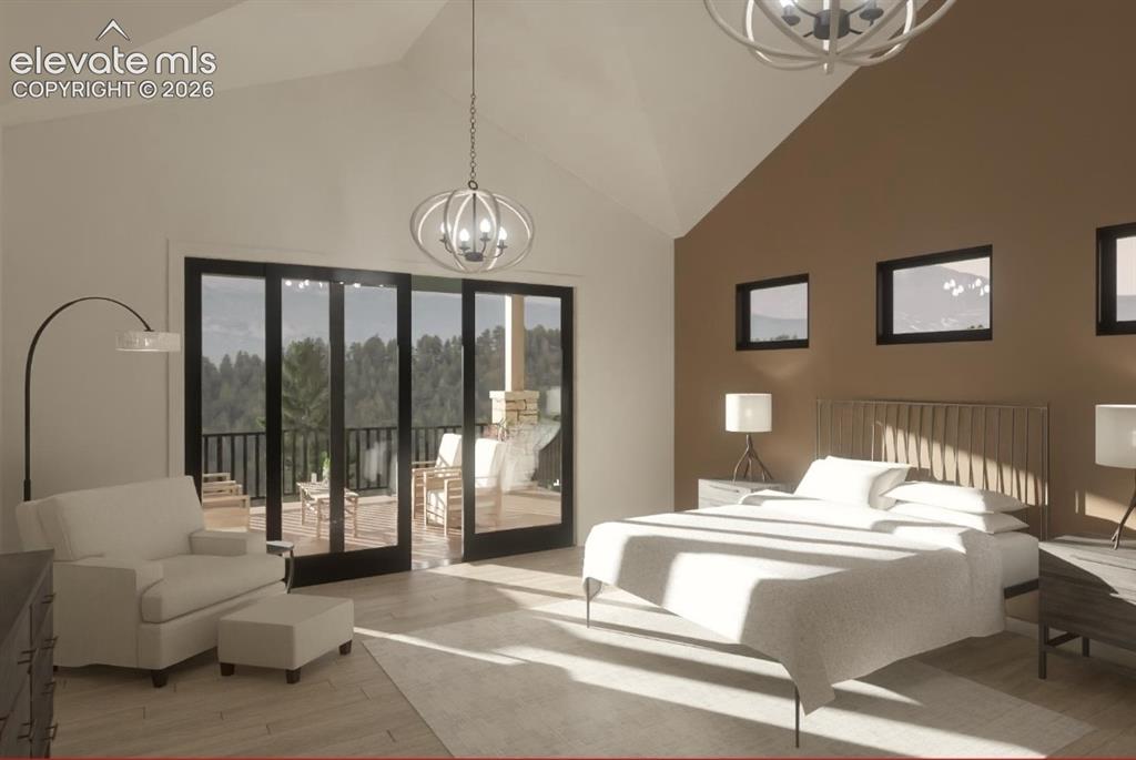 Image 20 of 24: Vaulted ceiling with a contemporary chandelier, multiple windows, and a sli
