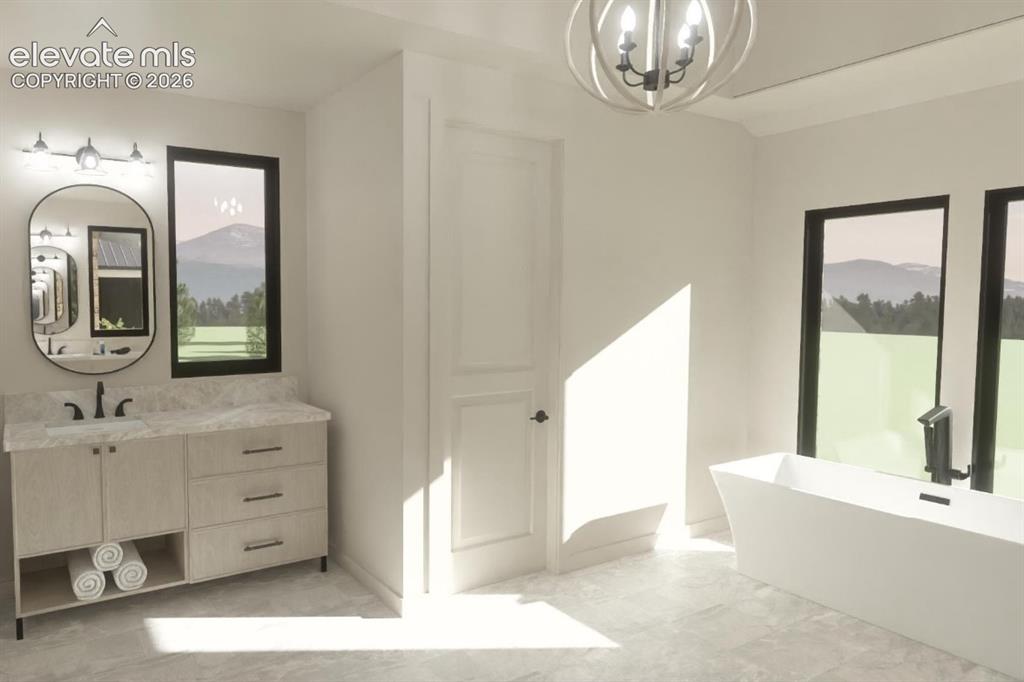 Image 21 of 24: Freestanding soaking tub, dual black-framed windows, vanity with integrated