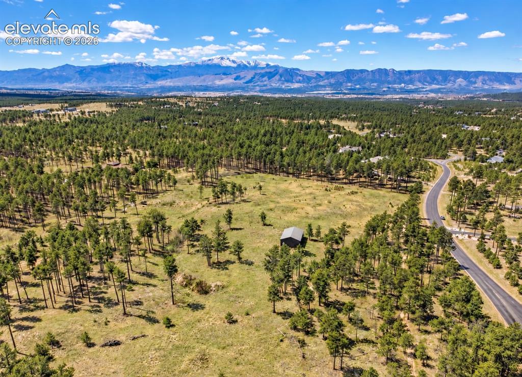 Image 4 of 25: Front Range Views on sprawling private, gates 5 acre lot.