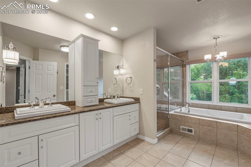 Image 24 of 49: Master Bathroom