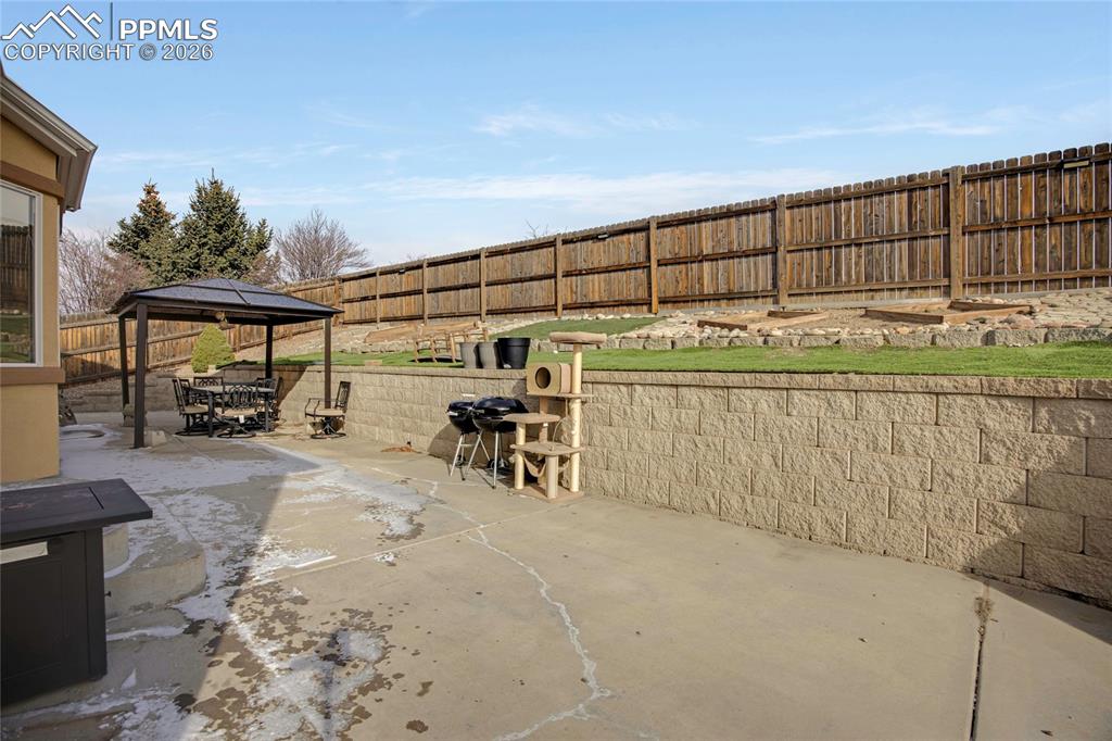 Image 35 of 36: Back Yard Patio