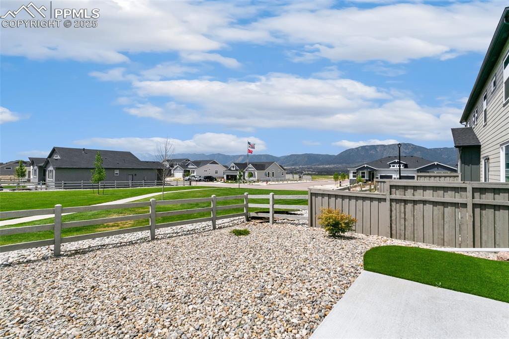 Image 45 of 50: View of yard featuring a residential view and a mountain view