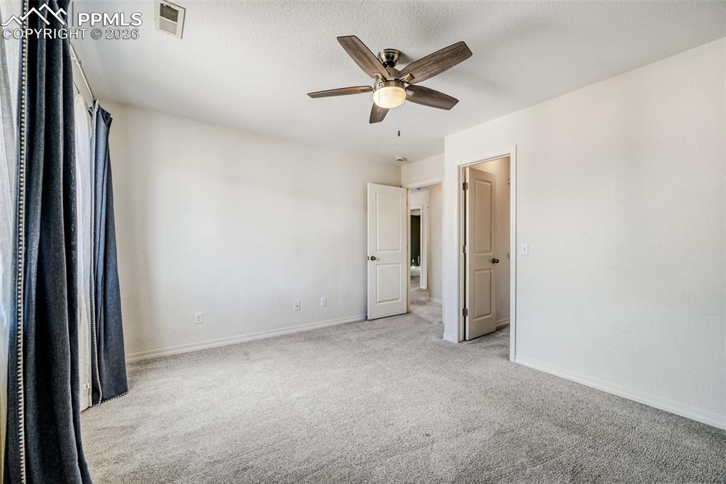 Image 20 of 26: Bedroom