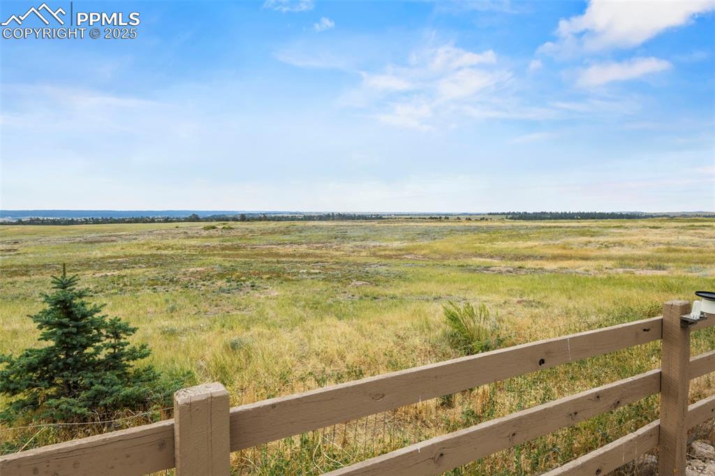 Image 27 of 32: View of yard featuring a view of rural / pastoral area