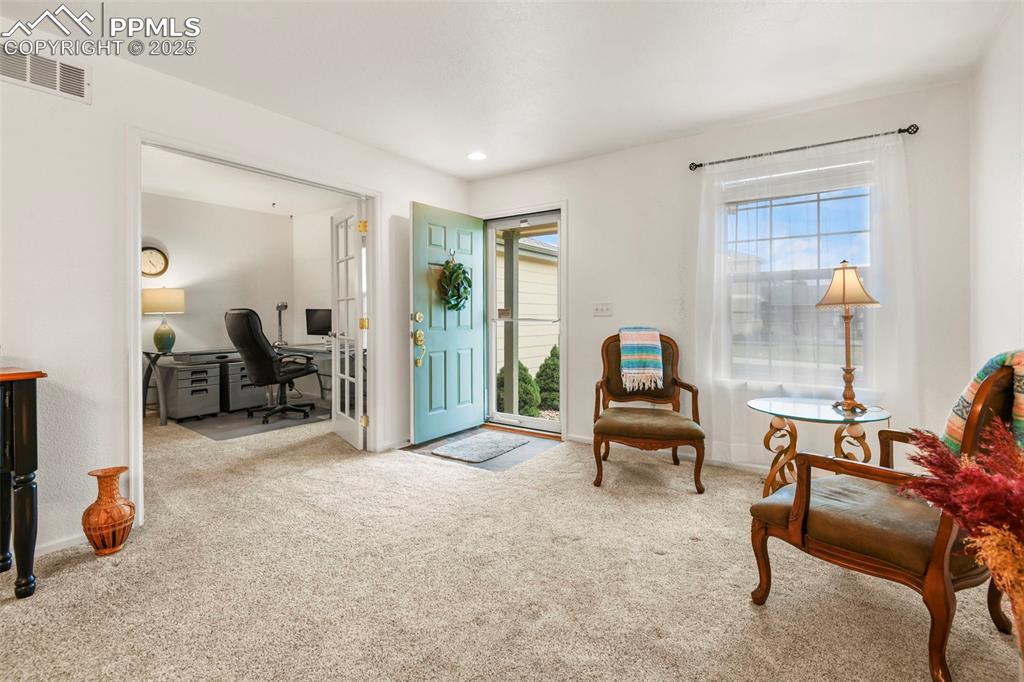 Image 8 of 32: Sitting room featuring an office area, carpet, and recessed lighting