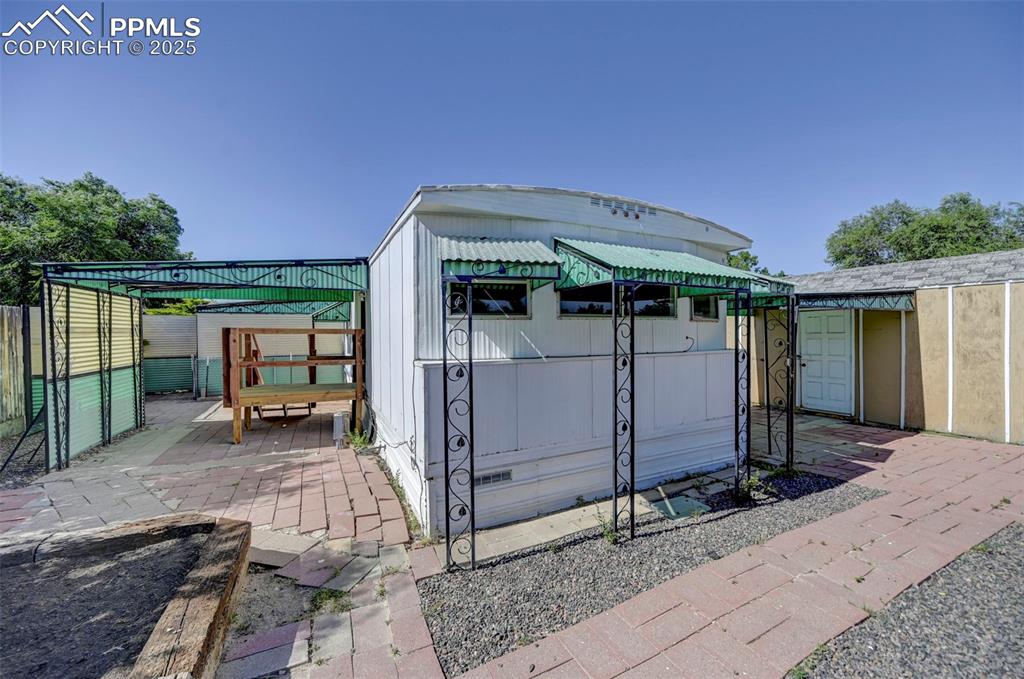 Image 23 of 26: View of rear patio