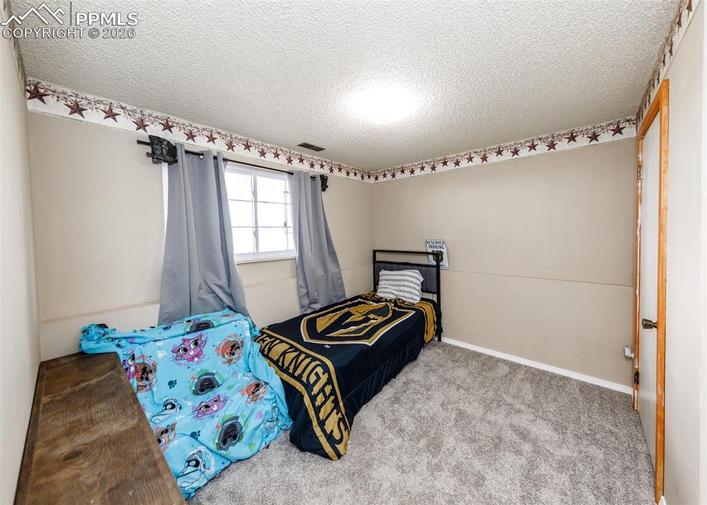 Image 25 of 50: Bedroom