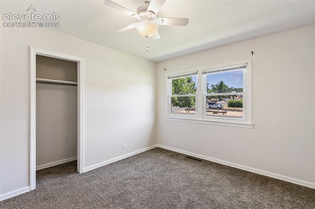 Image 17 of 26: Living room, dining room and kitchen