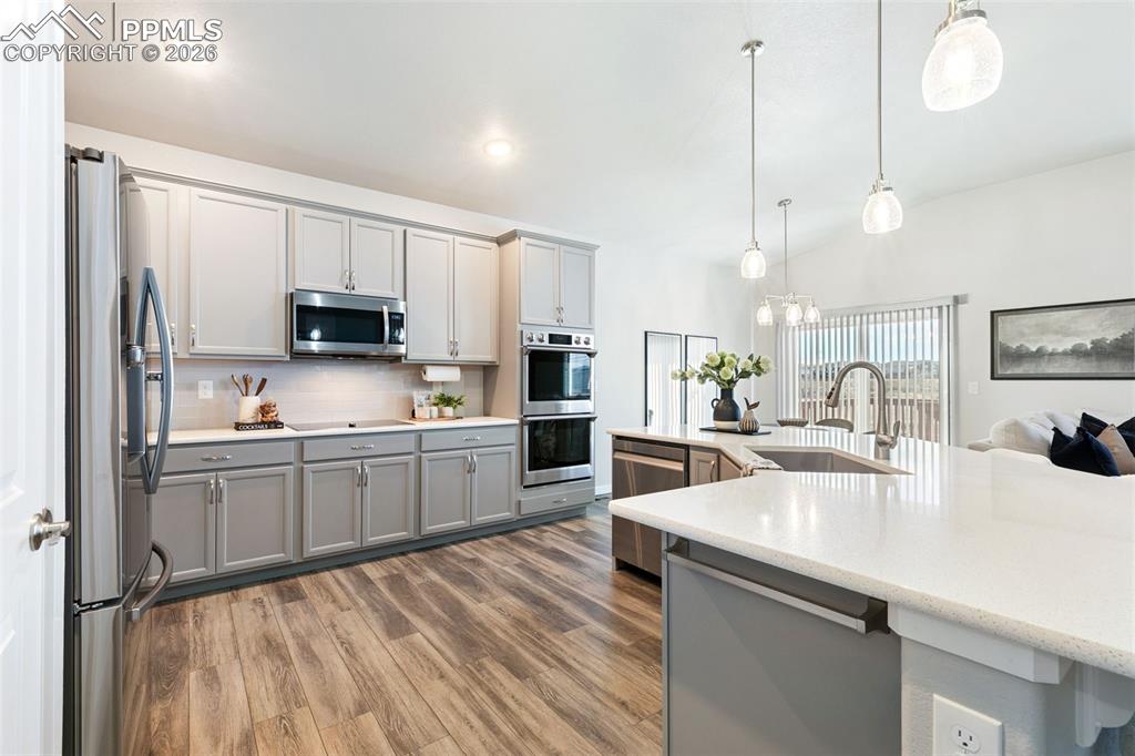 Image 3 of 24: Quartz Countertops Throughout