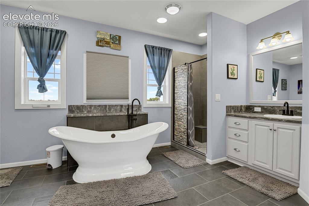 Image 19 of 50: Master Bathroom