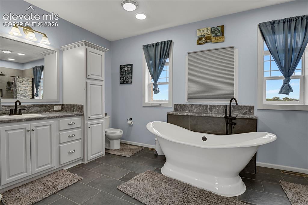 Image 20 of 50: Master Bathroom