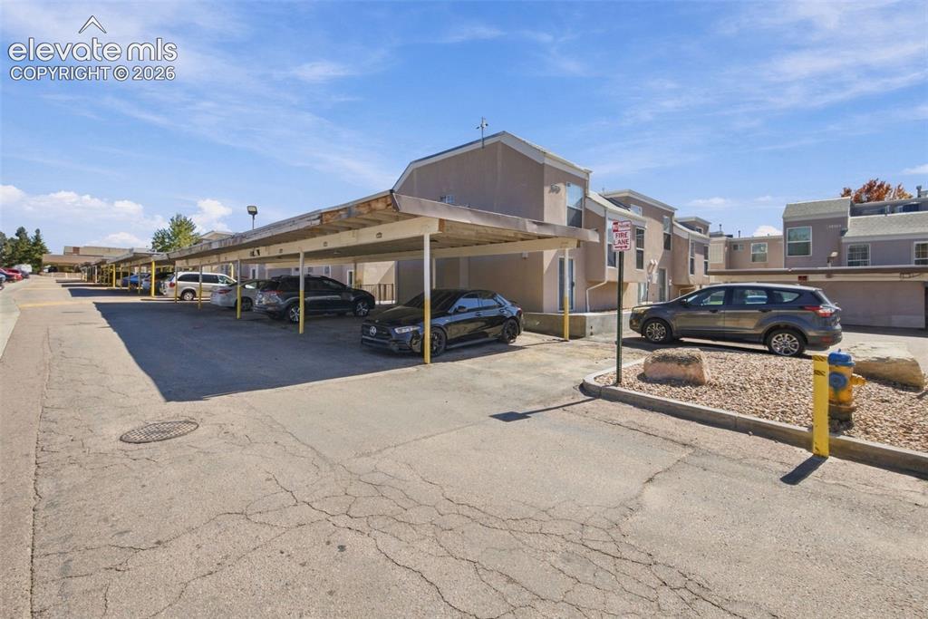 Image 25 of 26: Carport parking available