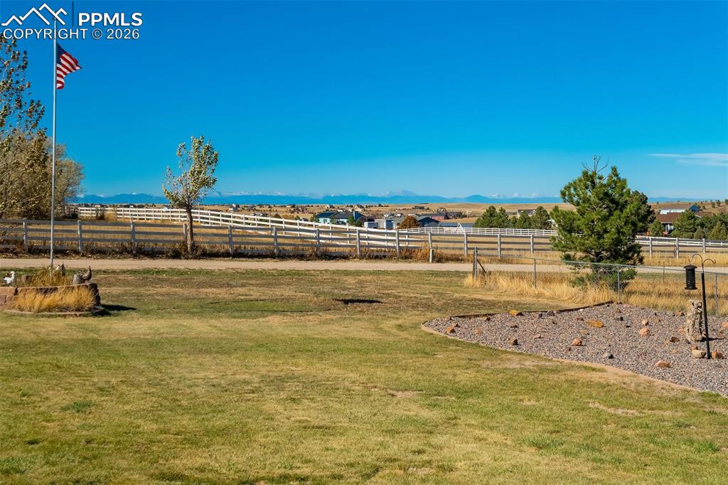 Image 7 of 50: View of yard with a mountain view and a view of rural / pastoral area
