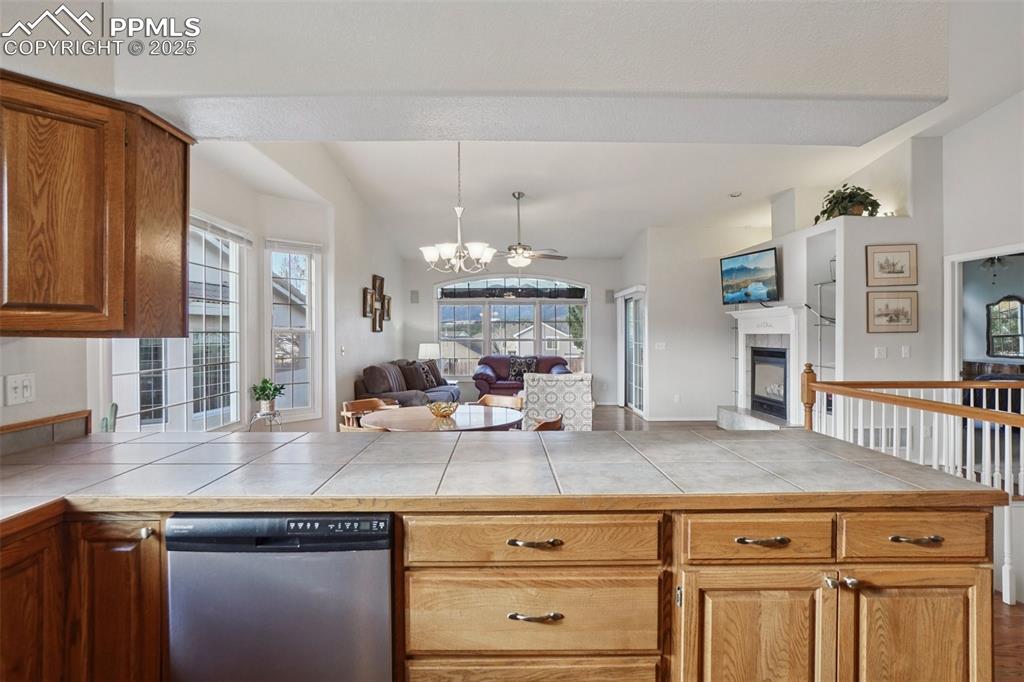 Image 14 of 42: Open kitchen with stainless steel appliances, ample storage space and kitch