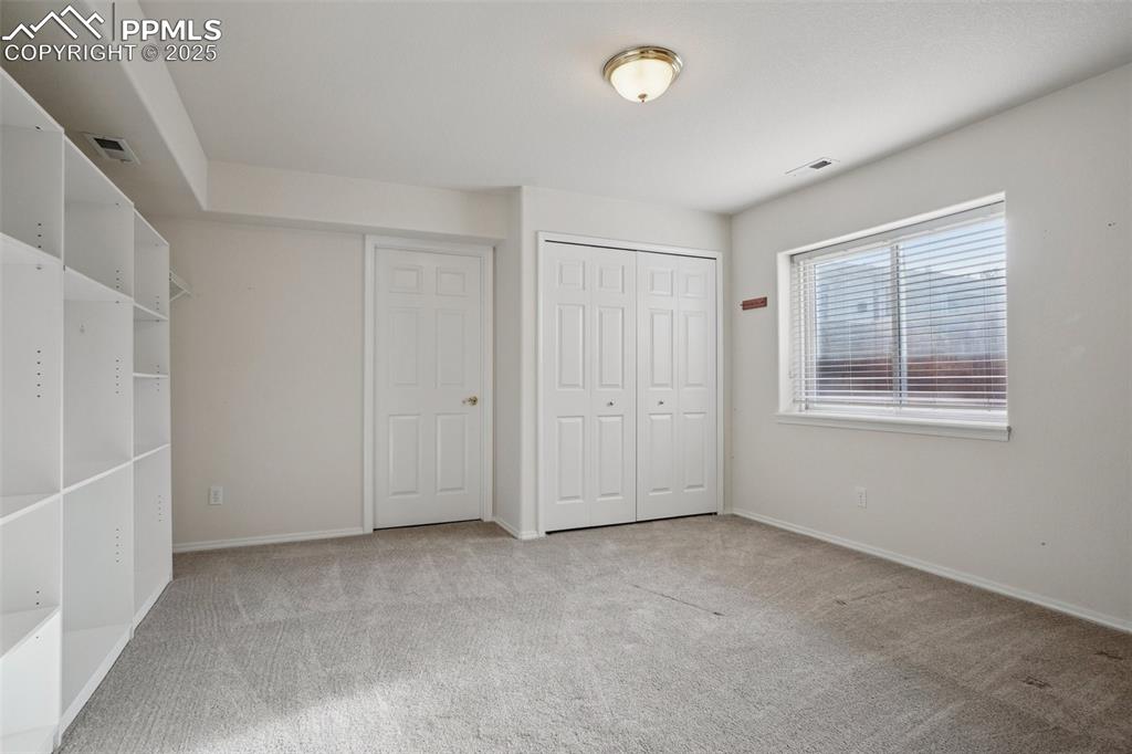 Image 28 of 42: Large secondary bedroom