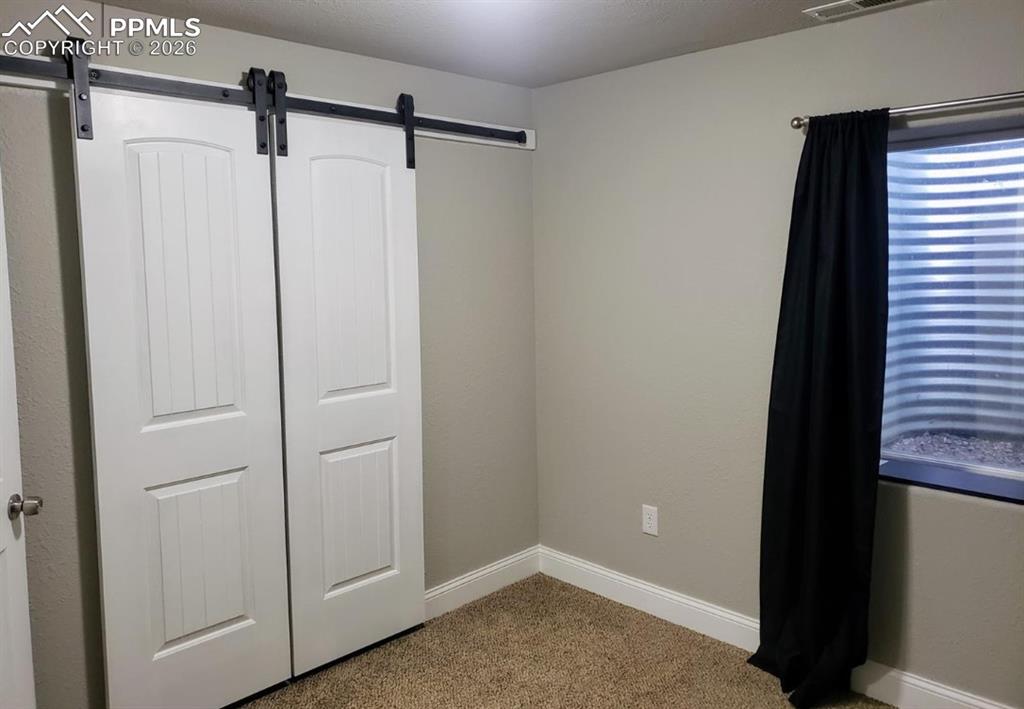 Image 27 of 31: Bedroom