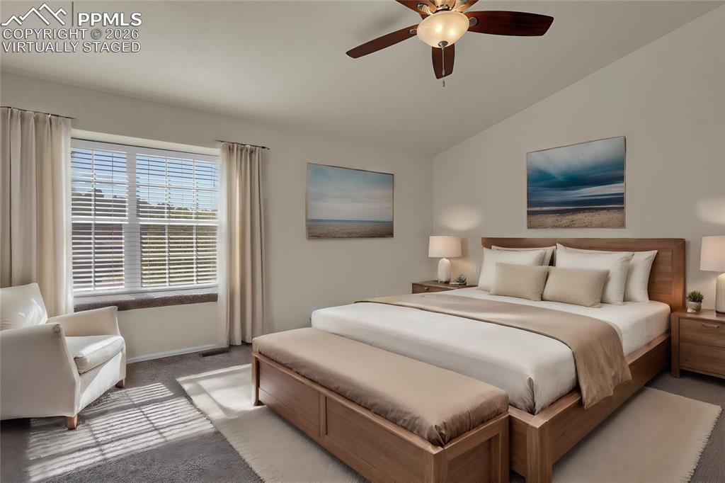 Image 11 of 26: Virtually staged primary bedroom