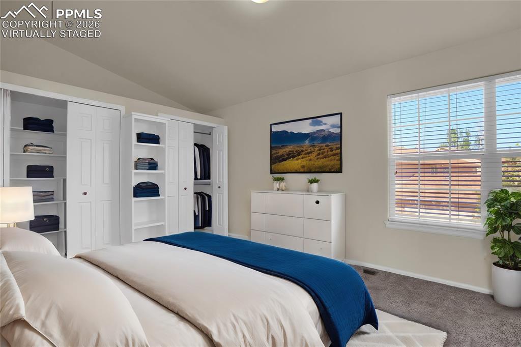 Image 14 of 26: Virtually staged bedroom 2, upstairs.