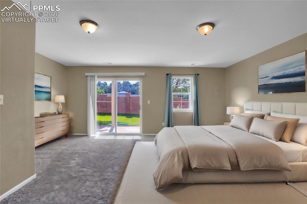 Image 19 of 26: Virtually staged basement bedroom