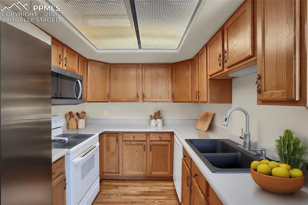 Image 8 of 26: Virtually staged kitchen