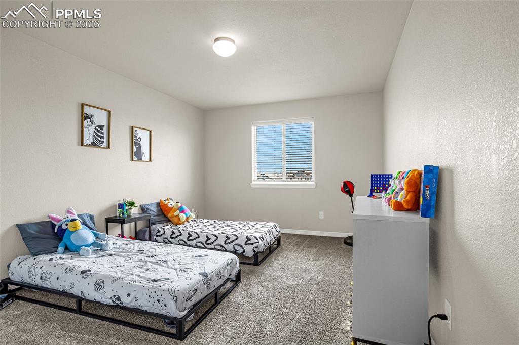 Image 18 of 38: Bedroom