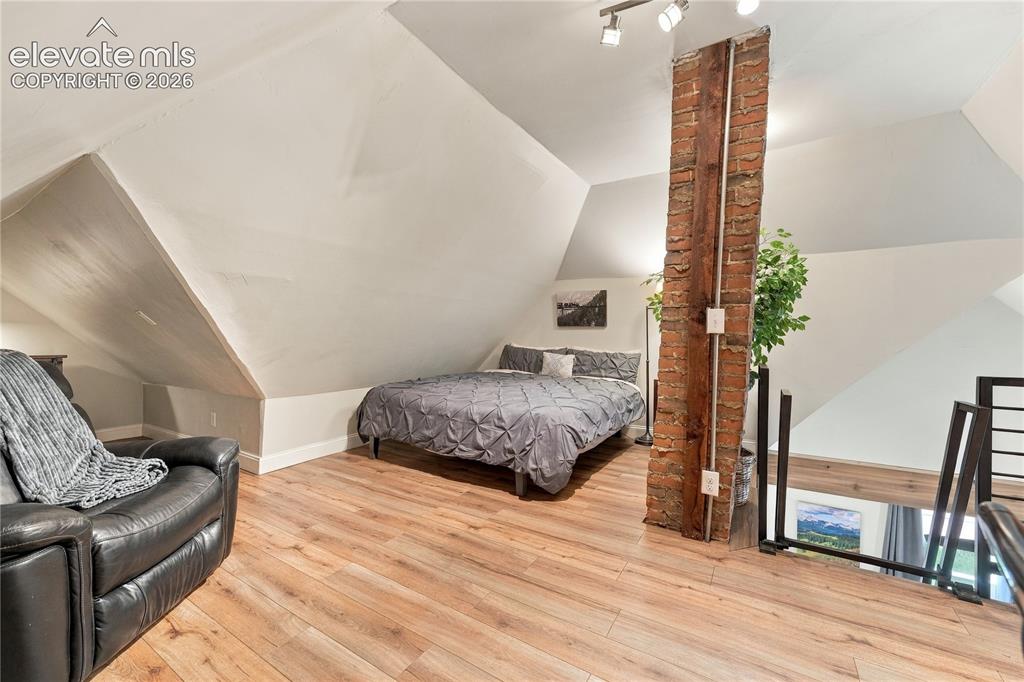 Image 20 of 50: Loft space large enough for guest space, office or craft area.