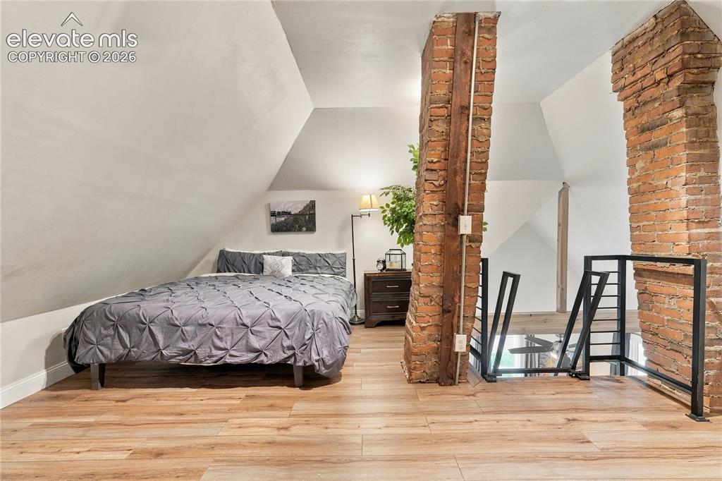 Image 21 of 50: Loft space large enough for guest space, office or craft area.