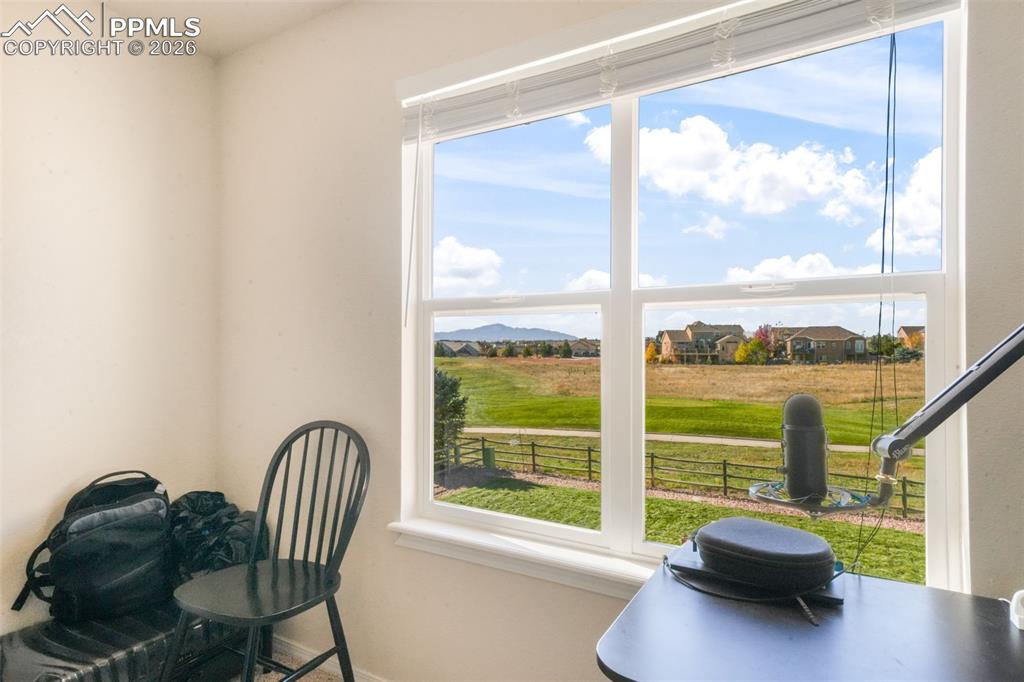 Image 22 of 50: Unfurnished room with high vaulted ceiling, carpet, and a ceiling fan