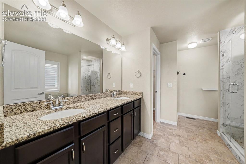 Image 16 of 48: Primary 5-Piece Bathroom with Updated Shower