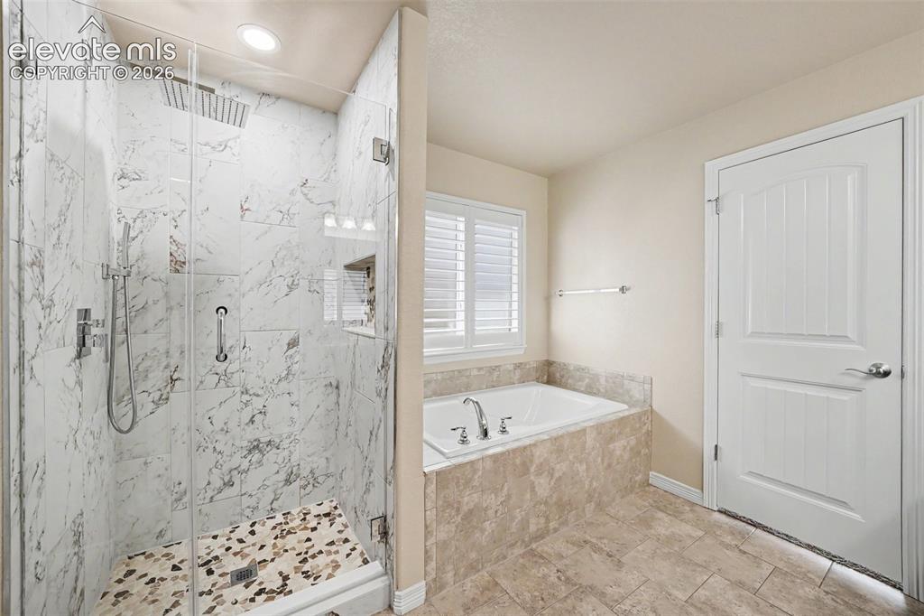 Image 17 of 48: Primary 5-Piece Bathroom with Updated Shower
