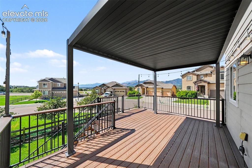 Image 27 of 48: Large Composite Deck and Pergola with Retractable Shade and Adjustable Louv