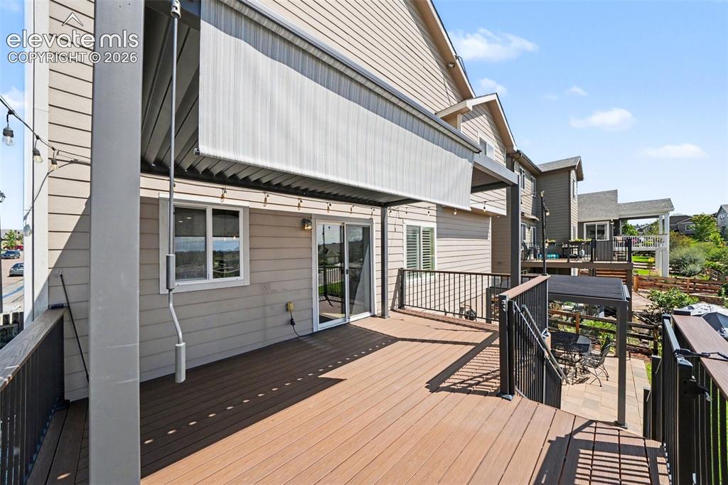 Image 28 of 48: Large Composite Deck and Pergola with Retractable Shade and Adjustable Louv