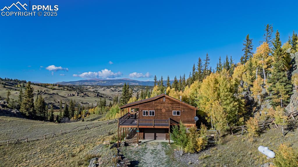 Image 41 of 48: View of mountain background with rural landscape
