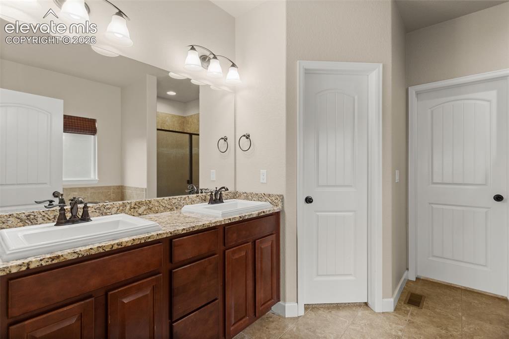 Image 10 of 20: Master Bathroom