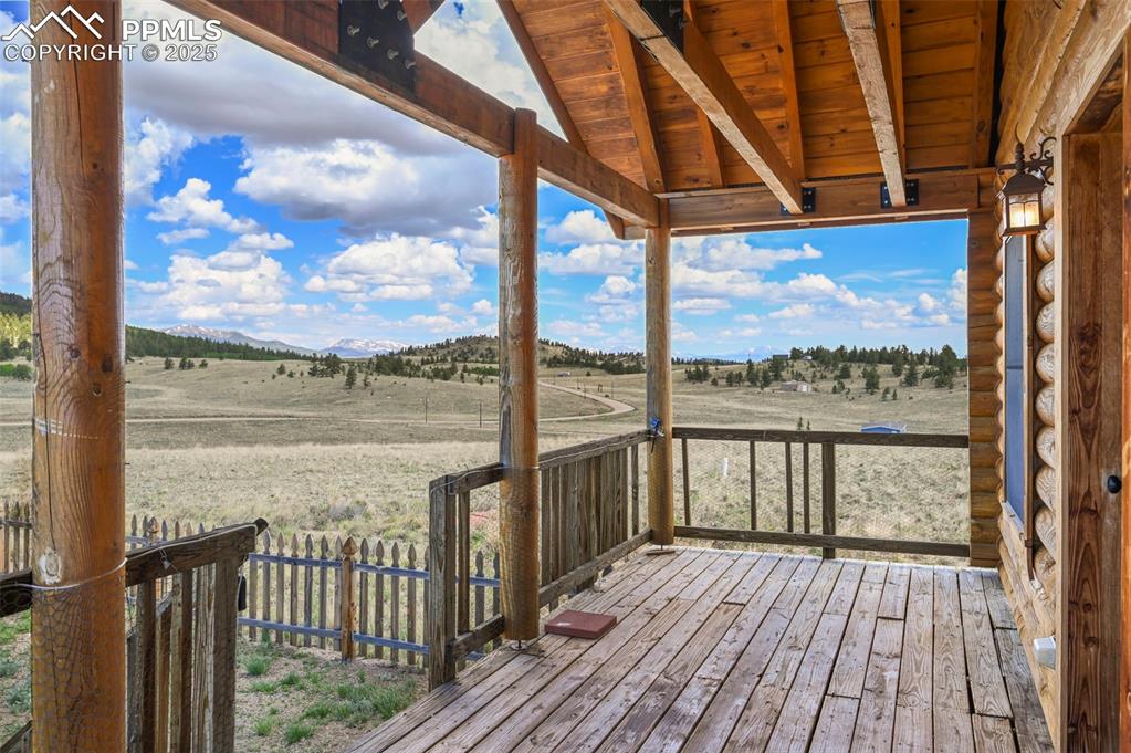 Image 3 of 35: Wooden deck with a rural view and a mountain view